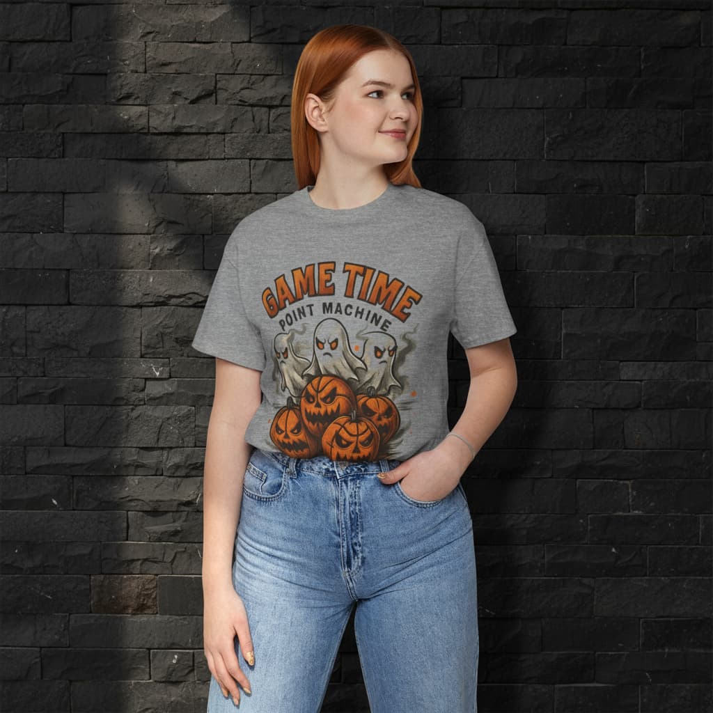 Woman wearing BG11 “Game Time Point Machine” Halloween basketball T-shirt with pumpkin and ghost design — spooky streetwear tee for basketball fans.