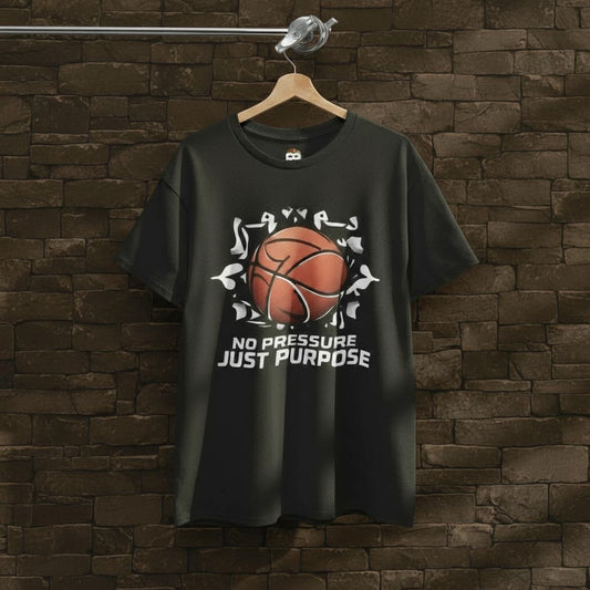 Black “No Pressure Just Purpose” Basketball Graphic T-Shirt Hanging on Brick Wall – Part of The GOAT Lineup Collection by BG11 Streetwear.